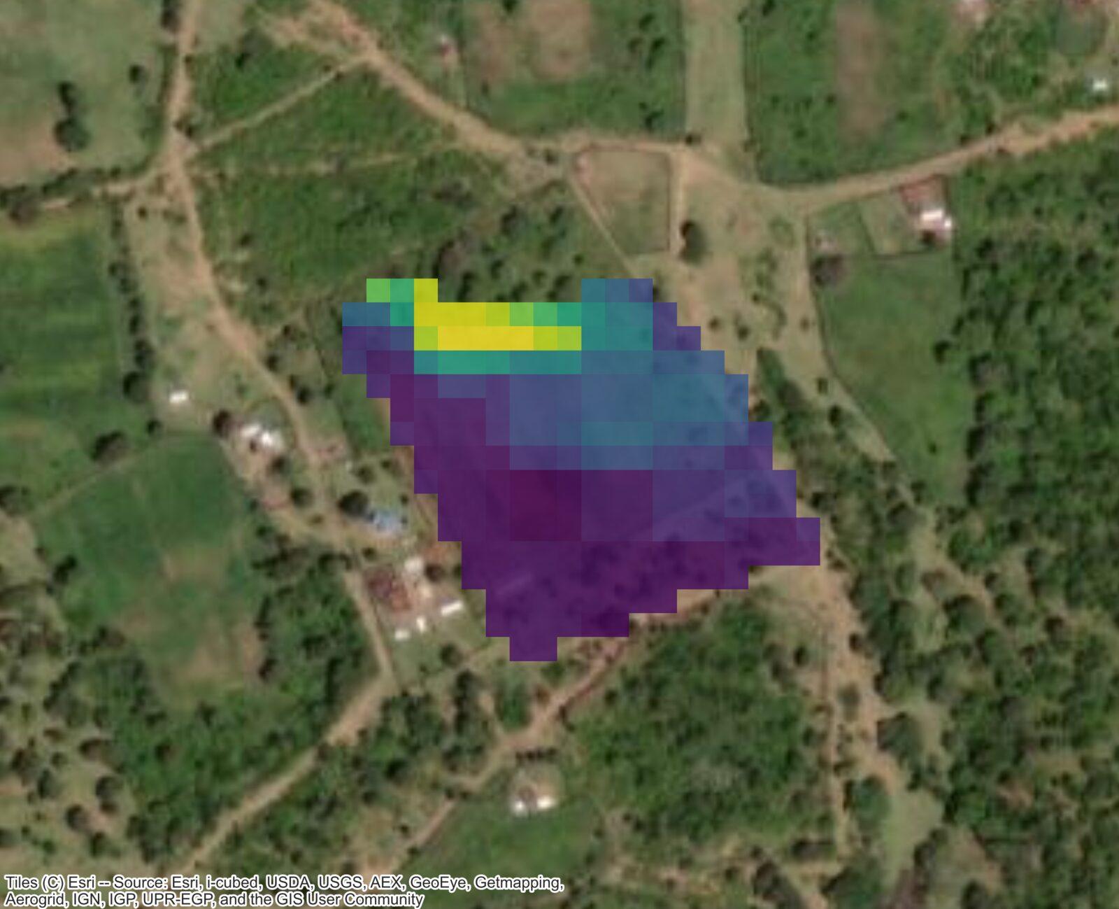 Soil organic carbon prediction map overlaid on a high-resolution aerial image of farmland
